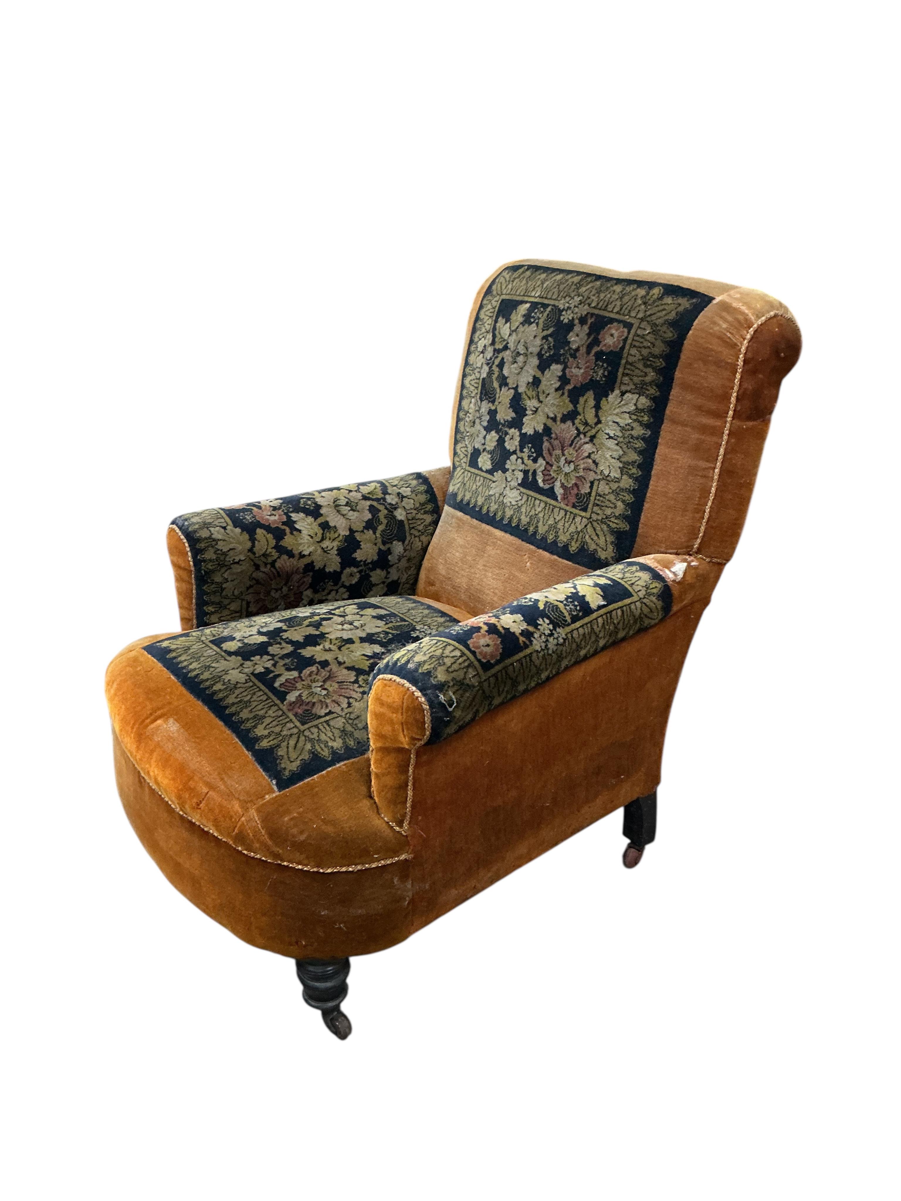 A late Victorian upholstered armchair, width 75cm, depth 74cm, height 88cm